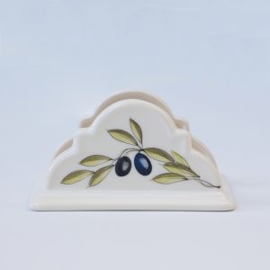 Ceramic napkin holder with a scalloped edge and hand-painted olive branch design